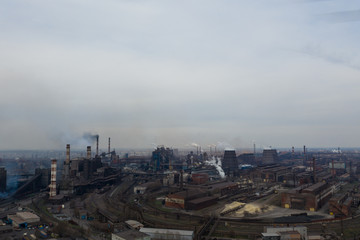 Polluting plant shot from above with a drone