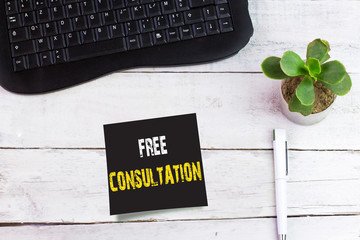 Writing note showing Free Consultation
