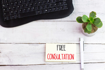 Writing note showing Free Consultation