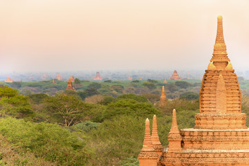 Close-up view of one of the many Buddhist temples in Bagan (formerly Pagan) during sunset. The Bagan Archaeological Zone is a main attraction in Myanmar with over 2,200 temples and pagodas.