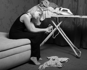 postpartum women's depression. the cleaning in the house. upset woman. wash diapers