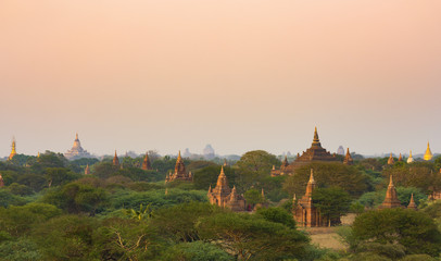 Stunning view of the beautiful Bagan ancient city (formerly Pagan) during sunset. The Bagan Archaeological Zone is a main attraction in Myanmar and over 2,200 temples and pagodas still survive today.