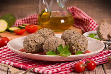 Meatballs with tomato sauce.