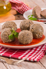 Meatballs with tomato sauce.