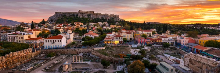 Selbstklebende Fototapeten View of Acropolis from a roof top coctail bar at sunset, Greece.  © milangonda