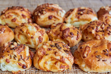 Buns with cheese on the table.