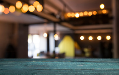 blurred background of bar and dark brown desk space of retro wood