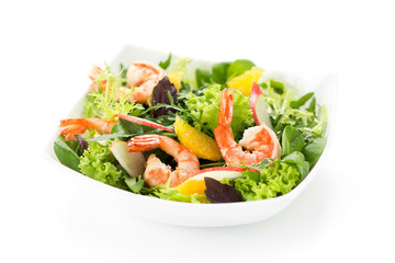 Fresh salad with shrimps on white background