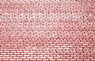 Obraz premium Pattern of brick wall with blur effect in red tone.