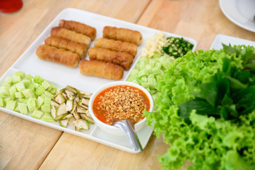 Nam-Neaung of Vietnamese food with roll pork, vegetable and sauce