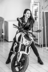 Fototapeta na wymiar portrait girl sitting on motorcycle