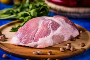 Raw pork on a wooden board