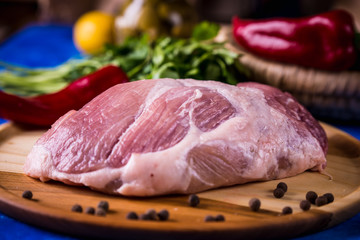 Raw pork on a wooden board