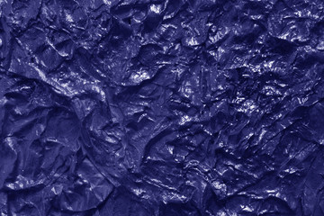Metal foil texture in blue color.