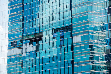 Plakat reflection of glass on skyscraper or modern building