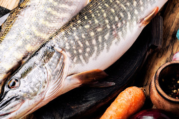 Fish pike on the kitchen board