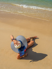 Young woman at the tropical beach