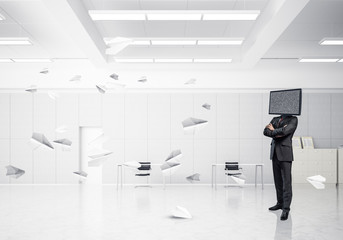 Businessman with TV instead of head.
