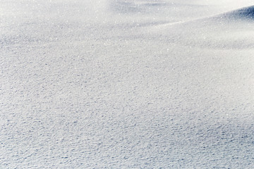 Winter, the surface of fresh fluffy snow, close-up, highlights, snowflakes, snowdrift