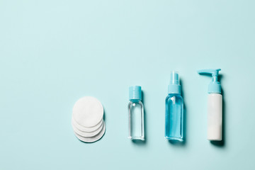 Set of cosmetics on a blue background. Flat lay.