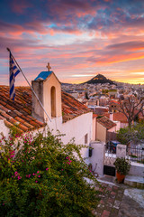 Naklejka premium View of Lycabettus hill from Anafiotika neighborhood in the old town of Athens, Greece. 
