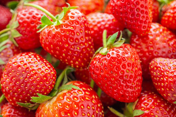 Fresh organic red ripe Strawberry fruit background closeup