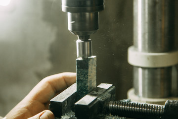 Drilling holes on wood parts. Shop with machines for wood processing.