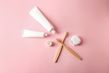 Set for dental hygiene on color background