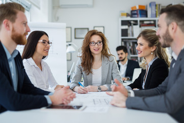 Portrait of architects having discussion in office