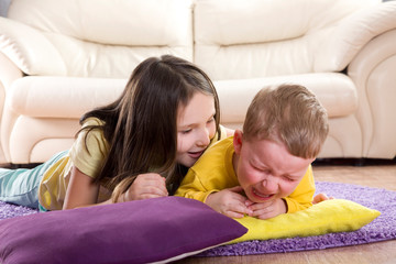 the conflict between a boy and a girl.  sibling relationships. the baby is crying. The child bites. Older kids bullied younger