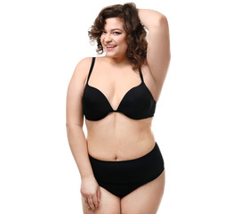Obraz premium Happy plus size woman on white background. Concept of body positive