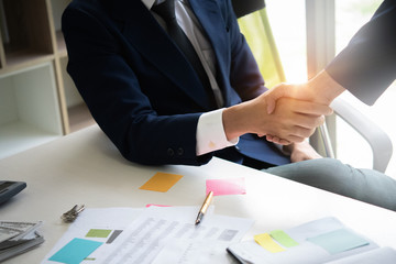 Close up of Business people shaking hands, finishing up meeting, business etiquette, congratulation, merger and acquisition concept