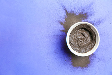 Cosmetic clay on color background