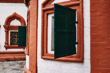 with green metal shutters