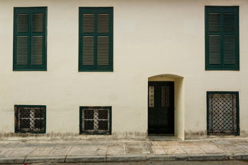 Facade of a neoclassical building in the old town of Athens, Greece. 