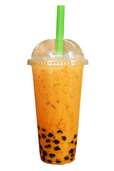 Milk tea put straw. Isolated Front View of Iced Thai Tea in plastic cup with plastic cap. on white background