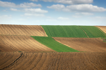 plowed field in spring farmland landscape agriculture