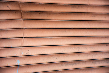 The wrinkled surface of the dirty blinds