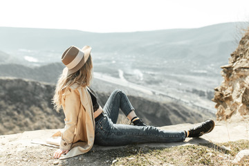 Girl travel blogger outdoors. The ancient capital and the Jvari monastery, Georgia. © pavelvozmischev