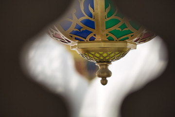 Image of chandelier through terrace