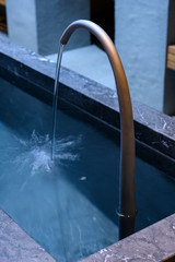Brunnen im Wasserbadraum in Luthernbad, Kanton Luzern, Schweiz