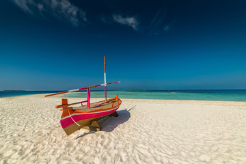 maldives, exotic destination for holiday or honeymoon, white coral beach with palms in paradise