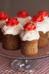 Easter cake with decorative sweet red flowers