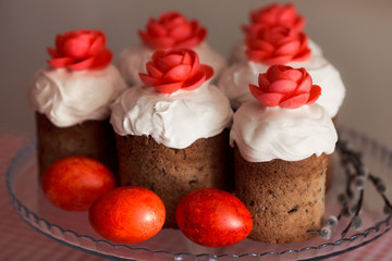 Easter cake with decorative sweet red flowers