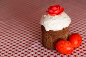 Easter cake with decorative sweet red flowers