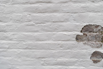 Old destroyed plaster on a wall