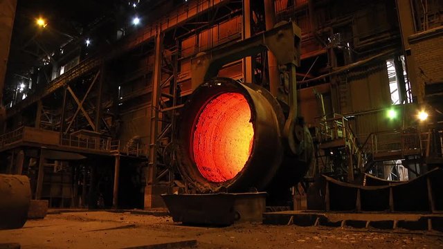 The hot bottom of the convector. Re-lining. The process of facing the bucket is chemically resistant and refractory materials.