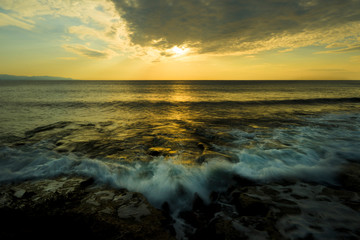 Fototapeta na wymiar sunset over the sea, taken with long exposure