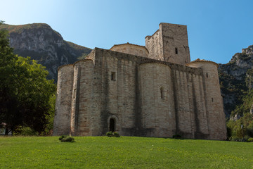Fototapeta na wymiar The stunning San Vittore alle Chiuse with it's round towers is a Roman Catholic abbey and church in the comune of Genga, Marche, Italy