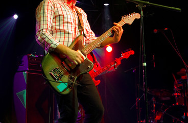 Guitarists at indie rock show 